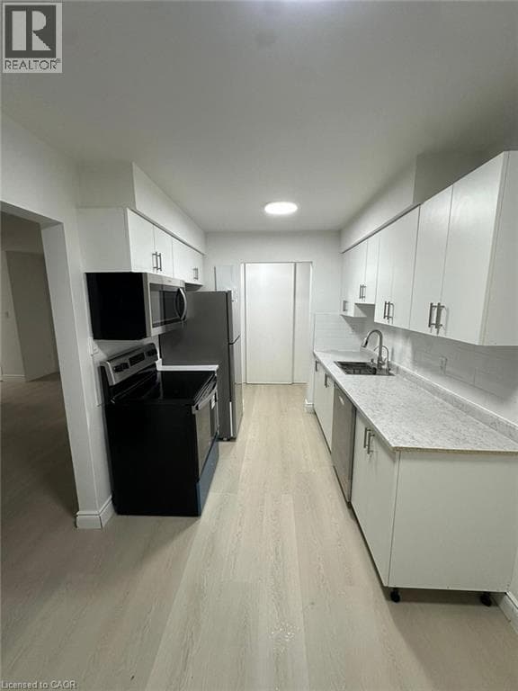 145 MACGREGOR Crescent Unit# 1 — photo 3