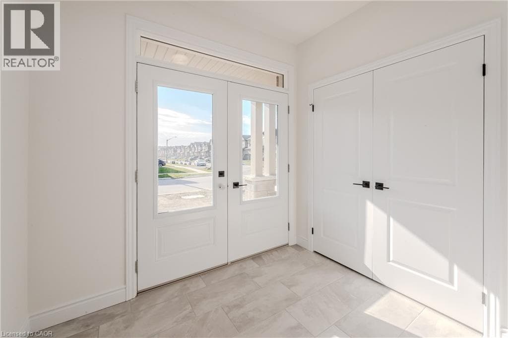 406 ROBERT WOOLNER Street — photo 2